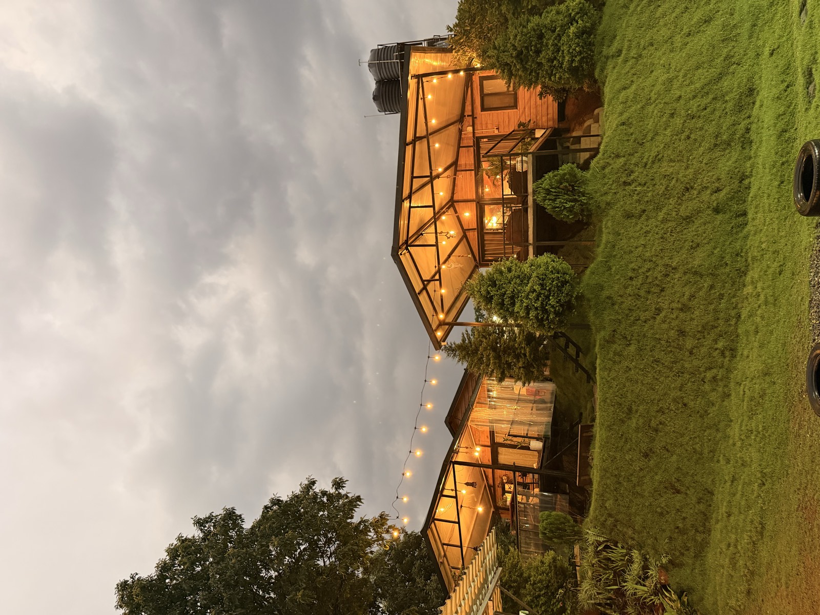 Glass cabins at dusk